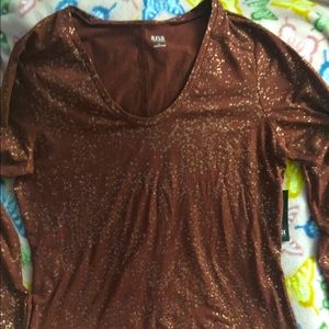 Copper colored shirt with beautiful gold print.